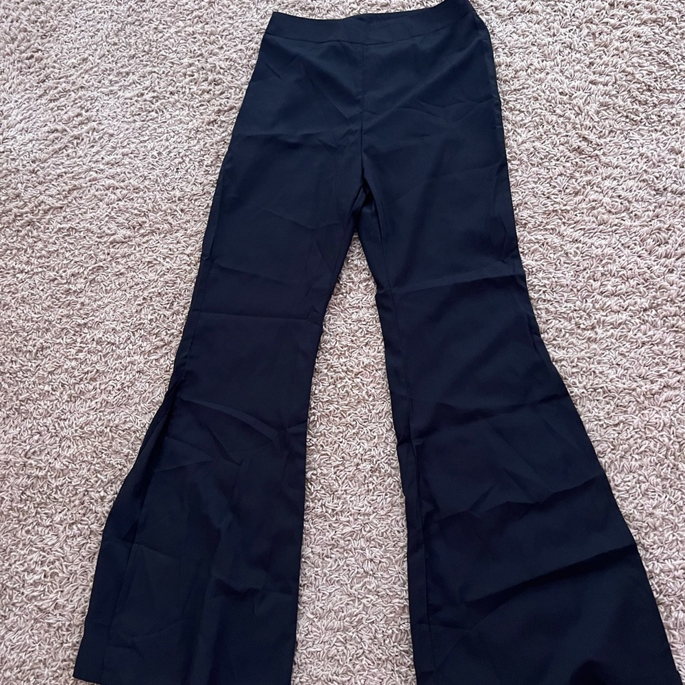 Super cute black slacks bell bottom from the bottom perfect with sneakers